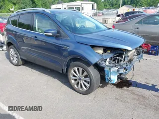 2018 Ford Escape Titanium with VIN 1FMCU9J92JUB01162, listed as a IAAI auction lot 42495112 with 96,280 mi miles and . Bid and sale history available at DreamBid. Image 1.