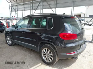 2017 Volkswagen Tiguan Wolfsburg Edition with VIN WVGRV7AX5HW501063, listed as a IAAI auction lot 42099362 with 76,597 mi miles and . Bid and sale history available at DreamBid. Image 3.