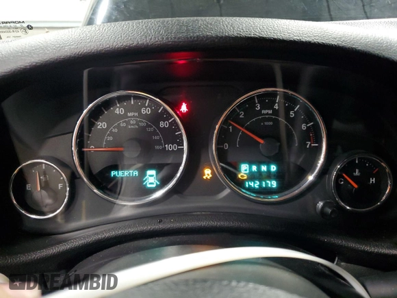 2012 Jeep Wrangler Unlimited Sahara with VIN 1C4BJWEG8CL235893, listed as a Copart auction lot 58195585 with 142,179 mi miles and Salvage title. Bid and sale history available at DreamBid. Image 9.
