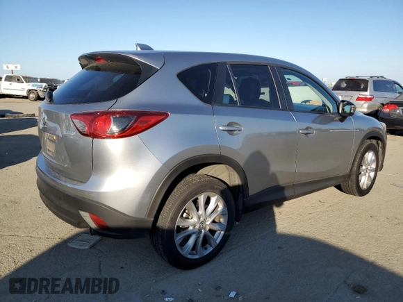 2014 Mazda CX-5 Grand Touring with VIN JM3KE2DY8E0412025, listed as a Copart auction lot 42863655 with 72,416 mi miles and Salvage Title. Bid and sale history available at carsss.com. Image 3.