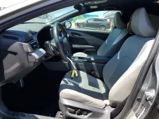 2025 Toyota Camry LE with VIN 4T1DAACK2SU517728, listed as a Copart auction lot 52567455 with 28,385 mi miles and Salvage Title. Bid and sale history available at DreamBid. Image 7.