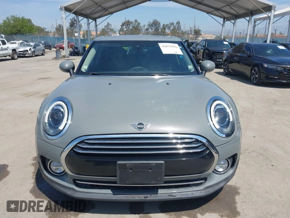 2019 MINI Clubman Cooper with VIN WMWLN5C57K2E34894, listed as a IAAI auction lot 42072962 with 49,274 mi miles and . Bid and sale history available at DreamBid. Image 12.