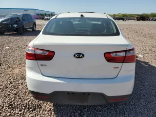 2014 Kia Rio LX with VIN KNADM4A38E6415462, listed as a Copart auction lot 52143555 with 60,079 mi miles and Salvage Title. Bid and sale history available at DreamBid. Image 6.