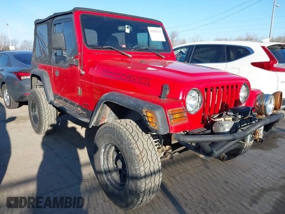 1997 Jeep Wrangler SE z VIN 1J4FY29PXVP476036, wystawiony jako IAAI lot #41882559 z przebiegiem 82 888 mil mil oraz . Historia ofert i sprzedaży dostępna na DreamBid. Obrazek 1.