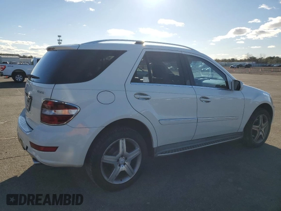2010 Mercedes-Benz M 550 with VIN 4JGBB7CB8AA602077, listed as a Copart auction lot 83598804 with 111,633 mi miles and Salvage Title. Bid and sale history available at DreamBid. Image 3.