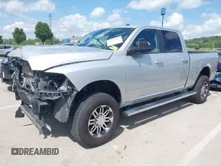 2018 Ram 2500 SLT with VIN 3C6UR5DL2JG300734, listed as a IAAI auction lot 42277603 with 74,923 mi miles and . Bid and sale history available at DreamBid. Image 2.