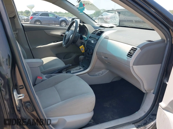 2010 Toyota Corolla with VIN 1NXBU4EEXAZ348970, listed as a IAAI auction lot 42454532 with 120,368 mi miles and . Bid and sale history available at DreamBid. Image 5.