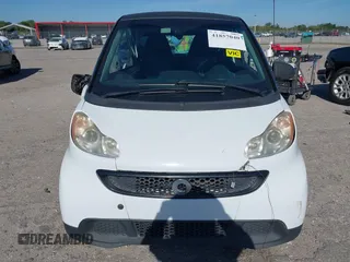 2013 Smart fortwo Pure z VIN WMEEJ3BA5DK619182, wystawiony jako IAAI lot #41857040 z przebiegiem 84 840 mil mil oraz . Historia ofert i sprzedaży dostępna na DreamBid. Obrazek 13.