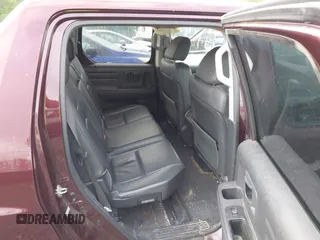 2010 Honda Ridgeline RTL with VIN 5FPYK1F57AB005602, listed as a IAAI auction lot 42208633 with 106,777 mi miles and . Bid and sale history available at DreamBid. Image 8.