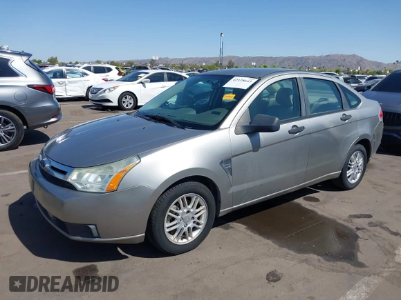 2008 Ford Focus SE with VIN 1FAHP35N68W154490, listed as a IAAI auction lot 42128643 with 141,316 mi miles. Bid and sale history available at carsss.com. Image 17.