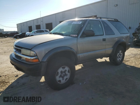 2004 Chevrolet Blazer LS z VIN 1GNCT18X94K116116, wystawiony jako Copart lot #42378015 z przebiegiem 112 272 mil mil oraz Czysty tytuł • Clean title. Historia ofert i sprzedaży dostępna na DreamBid. Obrazek 1.