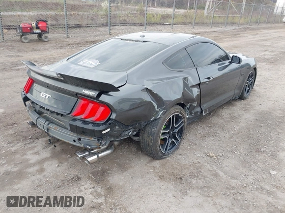 2018 Ford Mustang GT z VIN 1FA6P8CF9J5179766, wystawiony jako IAAI lot #41977000 z przebiegiem 83 608 mil mil oraz . Historia ofert i sprzedaży dostępna na DreamBid. Obrazek 4.