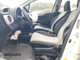 2012 Toyota Yaris L with VIN JTDKTUD30CD528470, listed as a Copart auction lot 79952414 with 157,062 mi miles and Salvage Title. Bid and sale history available at DreamBid. Image 7.