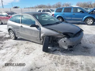 2007 Ford Focus S z VIN 1FAHP31N87W243692, wystawiony jako IAAI lot #41312958 z przebiegiem 184 717 mil mil oraz . Historia ofert i sprzedaży dostępna na DreamBid. Obrazek 1.