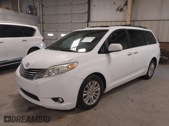 2011 Toyota Sienna XLE AAS with VIN 5TDYK3DC5BS130066, listed as a IAAI auction lot 41294340 with 156,591 mi miles and . Bid and sale history available at DreamBid. Image 2.