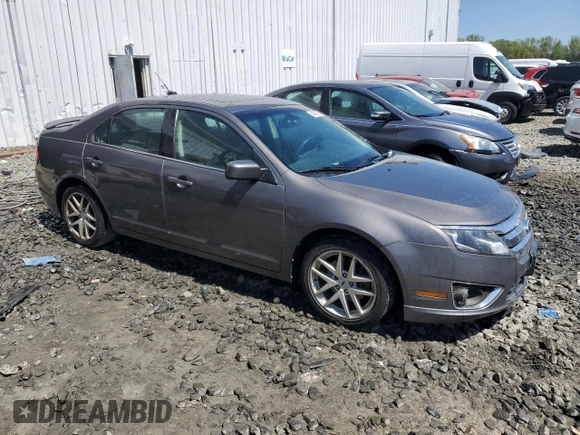 2012 Ford Fusion SEL z VIN 3FAHP0JA2CR293240, wystawiony jako Copart lot #54842035 z przebiegiem 236 208 mil mil oraz Szkoda całkowita • Salvage title. Historia ofert i sprzedaży dostępna na DreamBid. Obrazek 4.