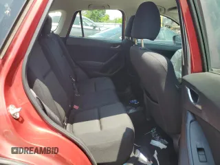 2016 Mazda CX-5 Sport with VIN JM3KE4BY3G0765905, listed as a Copart auction lot 61874165 with 134,546 mi miles and Salvage title. Bid and sale history available at DreamBid. Image 11.