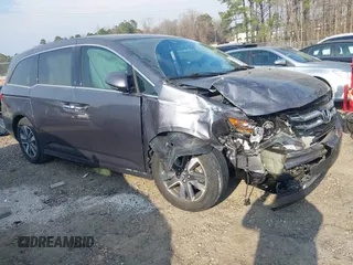 2016 Honda Odyssey Touring Elite with VIN 5FNRL5H92GB018560, listed as a IAAI auction lot 41796605 with 83,234 mi miles. Bid and sale history available at carsss.com. Image 1.