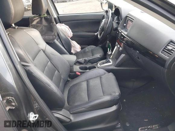 2015 Mazda CX-5 Grand Touring with VIN JM3KE4DY5F0470445, listed as a IAAI auction lot 41236468 with 87,845 mi miles. Bid and sale history available at carsss.com. Image 5.
