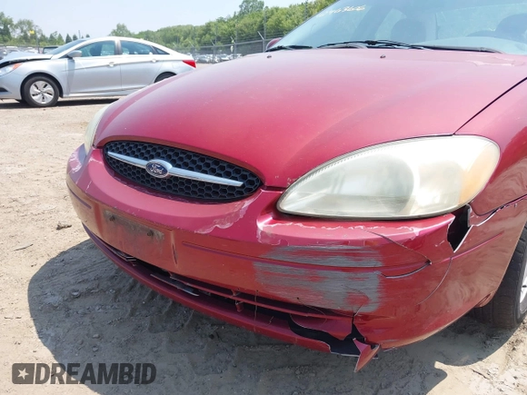 2003 Ford Taurus SE Standard with VIN 1FAFP53UX3G124702, listed as a IAAI auction lot 42463606 with 129,874 mi miles and . Bid and sale history available at DreamBid. Image 6.