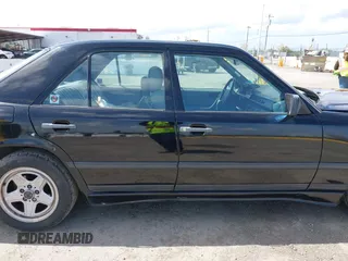 1987 Mercedes-Benz 300 with VIN WDBEA30D8HA397811, listed as a IAAI auction lot 41868336 with 124,720 mi miles. Bid and sale history available at carsss.com. Image 14.