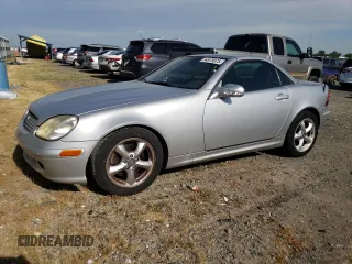2001 Mercedes-Benz SLK-Class with VIN WDBKK65F11F178256, listed as a Copart auction lot 54979975 with 95,439 mi miles and Salvage Title. Bid and sale history available at carsss.com. Image 1.