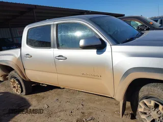 2017 Toyota Tacoma SR5 with VIN 3TMCZ5AN4HM056106, listed as a IAAI auction lot 41432290 with 120,676 mi miles and . Bid and sale history available at DreamBid. Image 14.