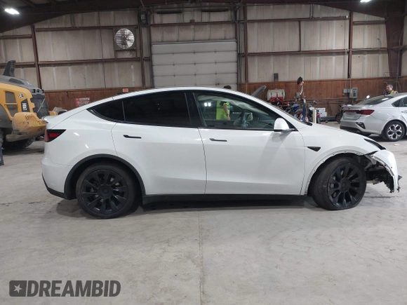 2020 Tesla Model Y Long Range z VIN 5YJYGDEE5LF041935, wystawiony jako IAAI lot #42369750 z przebiegiem 79 540 mil mil oraz . Historia ofert i sprzedaży dostępna na DreamBid. Obrazek 14.