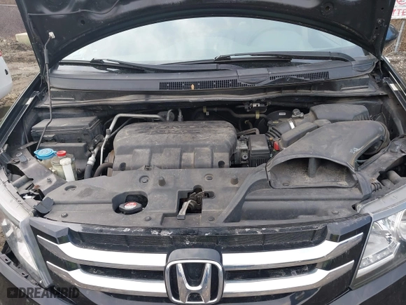 2016 Honda Odyssey SE with VIN 5FNRL5H39GB155488, listed as a IAAI auction lot 41702336 with 122,164 mi miles. Bid and sale history available at carsss.com. Image 10.