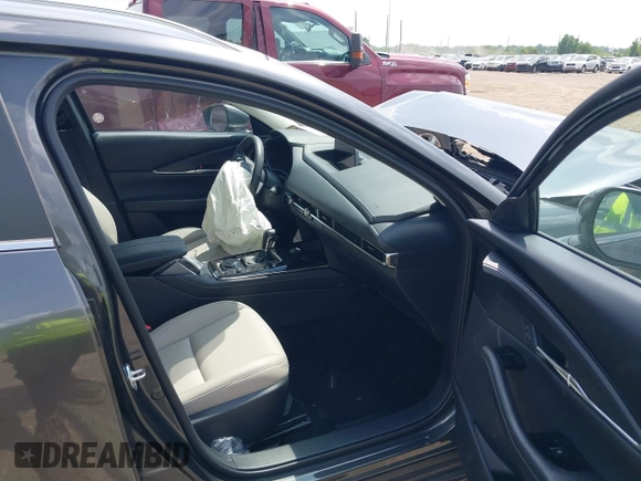 2025 Mazda CX-30 S Preferred with VIN 3MVDMBCM2SM776872, listed as a IAAI auction lot 42582130 with 9,541 mi miles and . Bid and sale history available at DreamBid. Image 5.