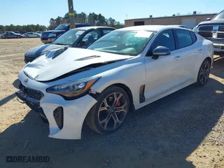 2019 Kia Stinger GT with VIN KNAE35LC8K6050559, listed as a IAAI auction lot 41699927 with 85,944 mi miles. Bid and sale history available at carsss.com. Image 2.