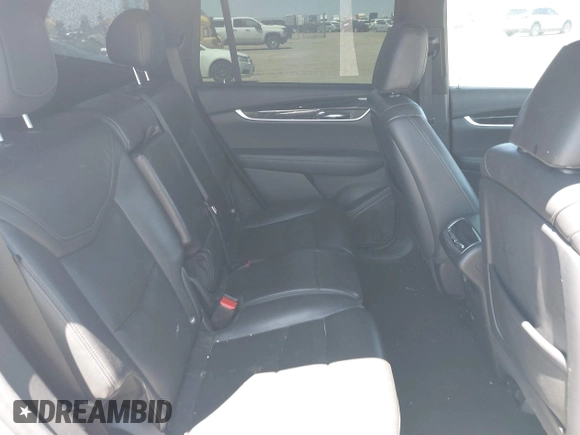 2020 Cadillac XT6 FWD Premium Luxury with VIN 1GYKPCRS7LZ104392, listed as a IAAI auction lot 42278675 with 81,001 mi miles and . Bid and sale history available at DreamBid. Image 8.