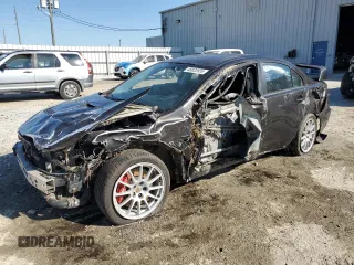 2015 Mitsubishi Lancer Evolution GSR with VIN JA32W8FV8FU023812, listed as a Copart auction lot 48822935 with 105,463 mi miles and Salvage Title. Bid and sale history available at carsss.com. Image 1.