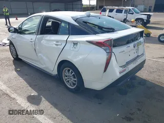 2017 Toyota Prius Two with VIN JTDKARFU9H3050782, listed as a IAAI auction lot 41988295 with 103,009 mi miles and . Bid and sale history available at DreamBid. Image 3.