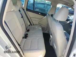 2012 Volkswagen Tiguan SE z VIN WVGAV7AX9CW531219, wystawiony jako Copart lot #81881644 z przebiegiem 125 695 mil mil oraz Szkoda całkowita • Salvage title. Historia ofert i sprzedaży dostępna na DreamBid. Obrazek 11.
