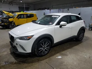 2018 Mazda CX-3 Touring with VIN JM1DKFC78J0308512, listed as a Copart auction lot 42397405 with 76,838 mi miles and Salvage Title. Bid and sale history available at carsss.com. Image 1.