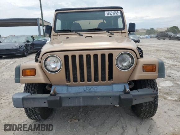 1999 Jeep Wrangler SE with VIN 1J4FY29P2XP451036, listed as a Copart auction lot 50551755 with 0 mi miles and Salvage Title. Bid and sale history available at carsss.com. Image 5.