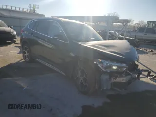 2016 BMW X1 xDrive28i with VIN WBXHT3C36GP880207, listed as a Copart auction lot 82597924 with 145,444 mi miles and Salvage Title. Bid and sale history available at carsss.com. Image 4.