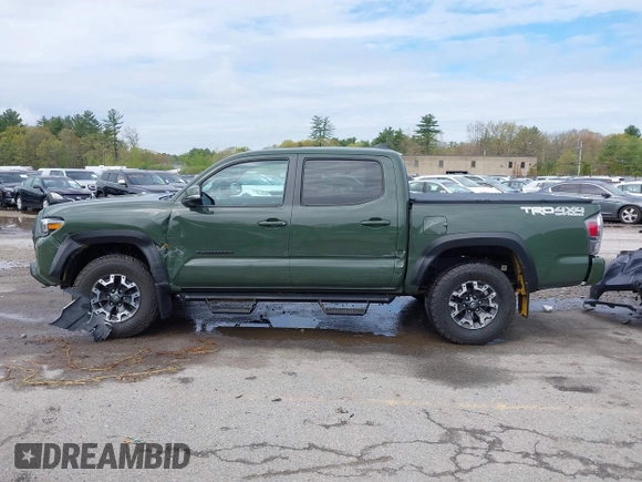 2021 Toyota Tacoma SR with VIN 3TMCZ5AN5MM380286, listed as a IAAI auction lot 42165523 with 58,965 mi miles and . Bid and sale history available at DreamBid. Image 14.