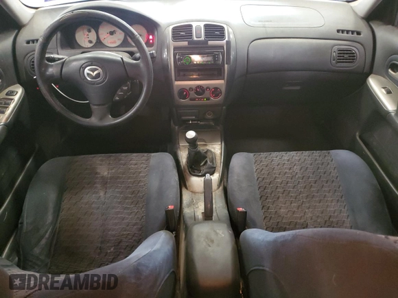2002 Mazda Protege z VIN JM1BJ245X21565456, wystawiony jako Copart lot #43756385 z przebiegiem 195 892 mil mil oraz Szkoda całkowita • Salvage title. Historia ofert i sprzedaży dostępna na DreamBid. Obrazek 8.