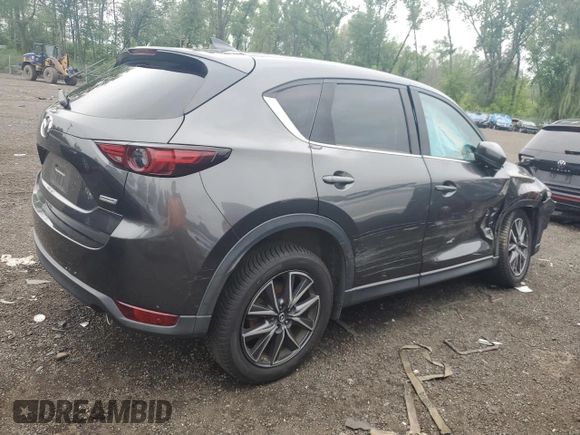 2018 Mazda CX-5 Grand Touring с VIN JM3KFBDM8J0424633, выставлен на аукционе Copart как лот 59888035 с пробегом 77 721 миль миль и Списание • Salvage title. История ставок и продаж доступна на DreamBid. Изображение 3.