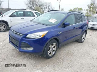 2016 Ford Escape SE with VIN 1FMCU0GX9GUB93543, listed as a IAAI auction lot 42017226 with 208,092 mi miles. Bid and sale history available at carsss.com. Image 2.
