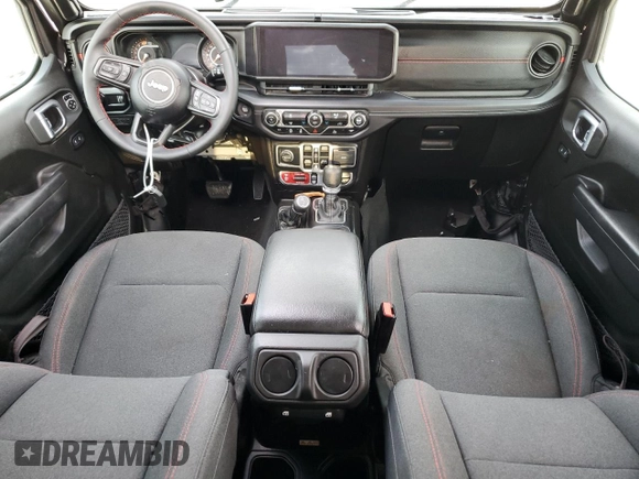 2024 Jeep Wrangler Rubicon z VIN 1C4PJXFG6RW261748, wystawiony jako Copart lot #51479585 z przebiegiem 7 911 mil mil oraz Szkoda całkowita • Salvage title. Historia ofert i sprzedaży dostępna na DreamBid. Obrazek 8.