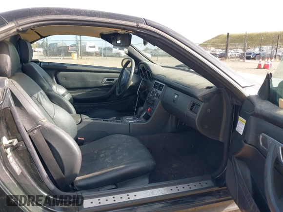 2003 Mercedes-Benz SLK-Class 2.3L with VIN WDBKK49F33F273872, listed as a IAAI auction lot 42111682 with 143,969 mi miles. Bid and sale history available at carsss.com. Image 5.