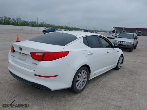 2015 Kia Optima EX with VIN 5XXGN4A76FG491572, listed as a IAAI auction lot 41940147 with 119,770 mi miles. Bid and sale history available at carsss.com. Image 4.
