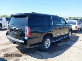 2016 GMC Yukon XL Denali with VIN 1GKS2HKJ2GR111246, listed as a IAAI auction lot 41834364 with 73,418 mi miles. Bid and sale history available at carsss.com. Image 4.