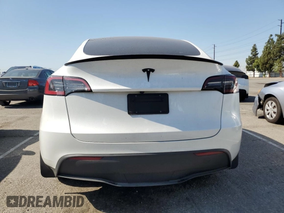 2024 Tesla Model Y с VIN 7SAYGDED6RF109727, выставлен на аукционе Copart как лот 59038725 с пробегом 14 948 миль миль и Списание • Salvage title. История ставок и продаж доступна на DreamBid. Изображение 6.