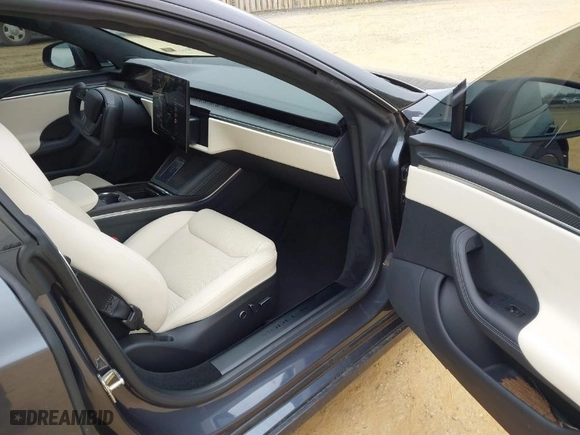 2022 Tesla Model S with VIN 5YJSA1E55NF492601, listed as a IAAI auction lot 41391782 with 27,738 mi miles. Bid and sale history available at carsss.com. Image 5.