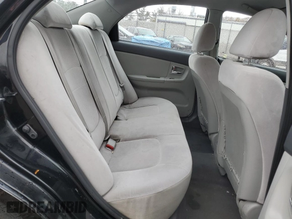 2009 Kia Spectra EX with VIN KNAFE222495648220, listed as a Copart auction lot 52886915 with 146,417 mi miles and Salvage title. Bid and sale history available at DreamBid. Image 10.