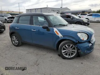 2012 MINI Countryman with VIN WMWZB3C51CWM02831, listed as a Copart auction lot 53821445 with 149,654 mi miles and Salvage Title. Bid and sale history available at DreamBid. Image 4.